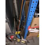 A trolley jack, petrol strimmer, large crowbar, yard brushes, light unit, etc.