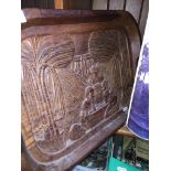 An African carved wooden tray