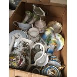 A box containing Noritake and other porcelain and china