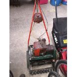 A Suffolk Super Punch 14" petrol lawn mower - no grass box.