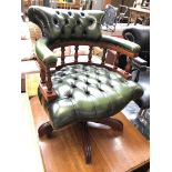 A reproduction captains office swivel chair