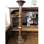 A hardwood Corinthian column jardiniere stand