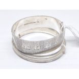 A hallmarked silver bangle and a foreign silver bangle, diameters approx. 60mm and 55mm, weight 60.