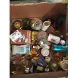 A box of perfumes, cosmetics, etc.