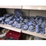 Over 80 pieces of Wedgwood pale blue jasperware including Christmas plates, City plates, vases,