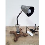 A contemporary Arts & Cracfts rustic angle lamp, the column formed from cast hallmarked silver and