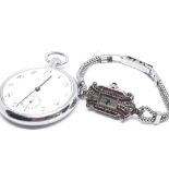 A Waltham pocket watch and an Art Deco white metal wristwatch set with pyrite and red paste.