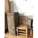 A child's bamboo chair and a Lloyd Loom corner bedding basket.