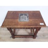 A contemporary Arts & Crafts rustic stool/table with resin slab set with hallmarked silver