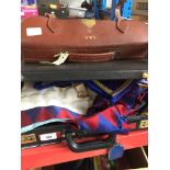A suitcase of Masonic ware and a leather briefcase.