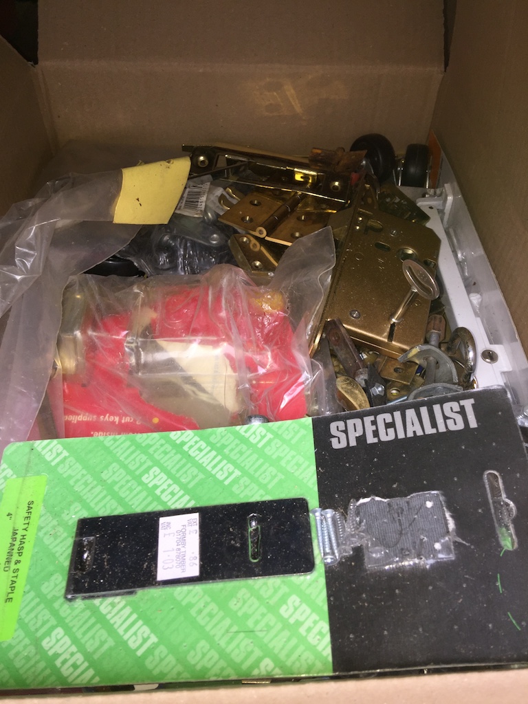 A box of DIY handles, locks, etc.