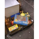 A box of vintage toys to include Dumbo the flying elephant, Tomy, etc.