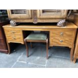 A reproduction dressing table and stool