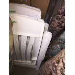 2 plastic folding garden chairs