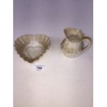 A small Belleek jug and heart shaped trinket dish, both with black back stamp