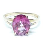 A pink topaz and diamond ring, band marked '9K', gross wt. 1.78g, size P.