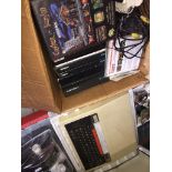 A BBC micro computer, assorted software, books, controllers, etc