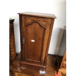 A Victorian mahogany pot cupboard.