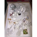 A collection of small Swarovski and other similar ornaments