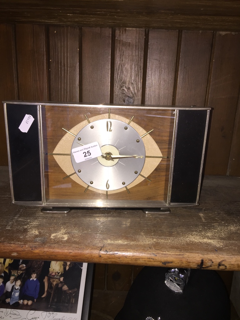 A vintage Metamec clock - in working order.