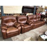 A brown leather three piece electric reclining suite