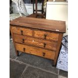 An oak chest of drawers