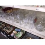 A collection of glassware, mainly crystal drinking glasses, also includes coloured glasses, tazza,