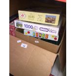 A box of jigsaws.