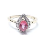 A hallmarked 9ct gold pink sapphire and colourless stone ring, gross wt. 2.12g, size O.