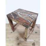 A contemporary Arts & Crafts rustic table the top cast in resin and set with cast hallmarked silver,