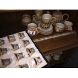 brown pottery teaware and boxed set og glasses
