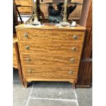 A reproduction chest of drawers