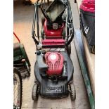 A Mountfield petrol lawn mower