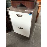 A metal two drawer filing cabinet