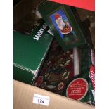 A box of Xmas decorations including Santa's marching band - boxed, a dancing Santa, a Holiday