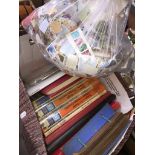 Stamps - various reference books, albums, mint sets of greetings stamps, and a large bag of GB
