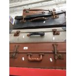 4 vintage suitcases