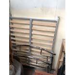 A metal double bed frame