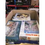 A large box of jigsaw puzzles.