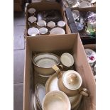 Two boxes containing Denby dinnerware