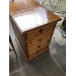 A pine two drawer filing cabinet