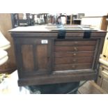 An early 20th century tambour front cabinet (as found).