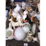 A box of mixed ceramics including several cat ornaments and a Beswick cow