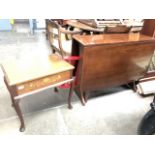 A mahogany drop leaf table, a hinged top inlaid occasional table and a red wooden folding chair