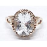 A hallmarked 9ct gold ring set with an oval mixed cut aquamarine weighing approx. 3.09 carats, gross