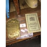 An old brass plaque - The George And Dragon Inn, dated 1853 together with an old identity card