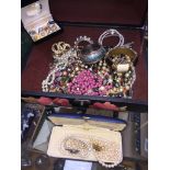 Wooden box of costume jewellery