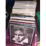A box of classical LPs.