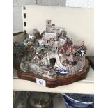 A Lilliput Lane St Peter's Cove fishing village in box with base