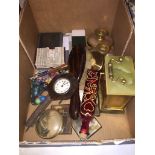 A box of collectables including tortoise shell clock, glass projector slides, mantle clock, etc